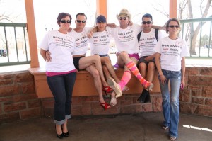 A group who participated in the 2013 Walk A Mile event show off their shoes. Photo by Dennis Wagner