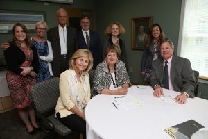 Seated, from left: Priscilla Barsotti, foundation trustee; Pam Shockley-Zalabak, UCCS chancellor; Bill Corrigan, foundation trustee. Standing, from left: Jaime Garcia, executive director of development, UCCS; Jean Corrigan; Bruce Buell; Drew Martorella; executive director, UCCS Presents; Daisy McGowan, director, GOCA; Nicole Anthony, community cultivation director, GOCA.